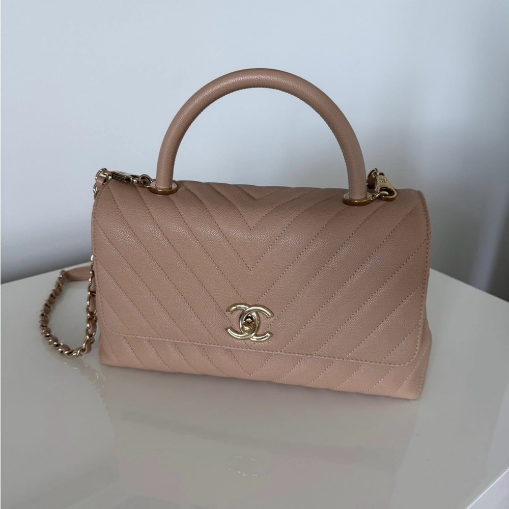 Chanel Coco Handle Bag
Beige Chevron Caviar